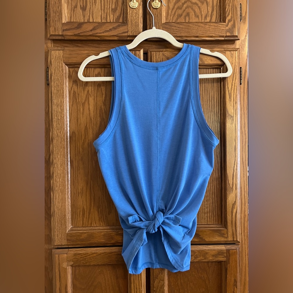 Peach athletic tank - center seam split back.